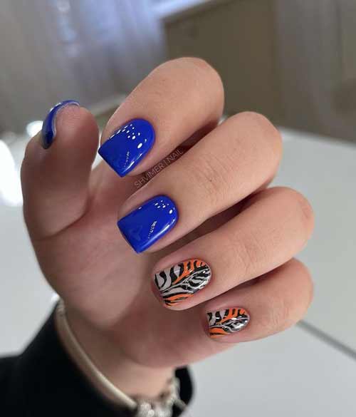 Синий тигр на ногтях